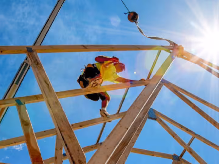 Person climbing a metal structure