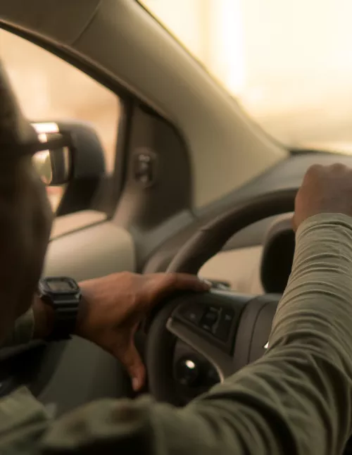 Person driving a car